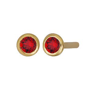 ruby studs on white background