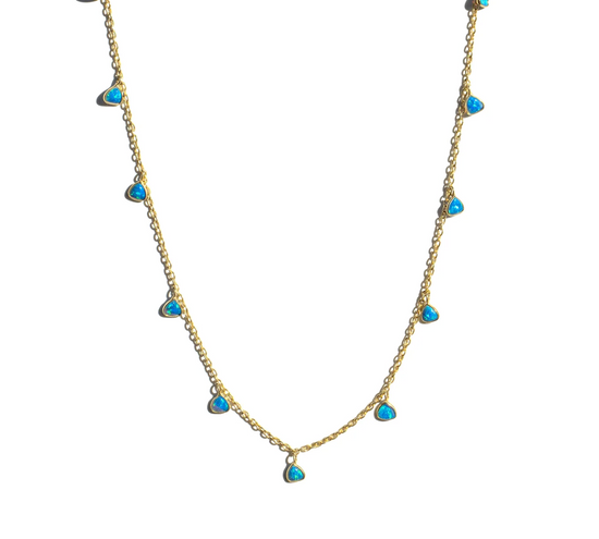gold necklace with multiple trillion (triangle) shaped opal charms on a white background