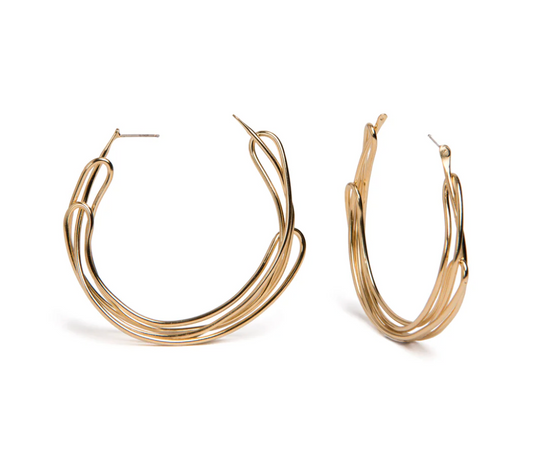 Side and front view of gold plated brass looped hoop earrings on white background