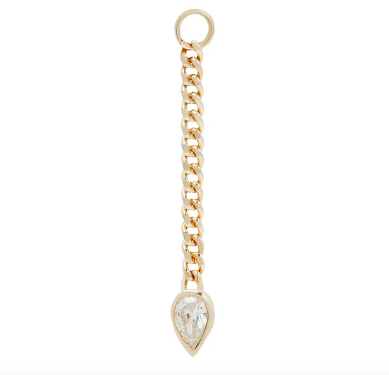 gold chain earring charm with a pear shaped cubic zirconia on a white background