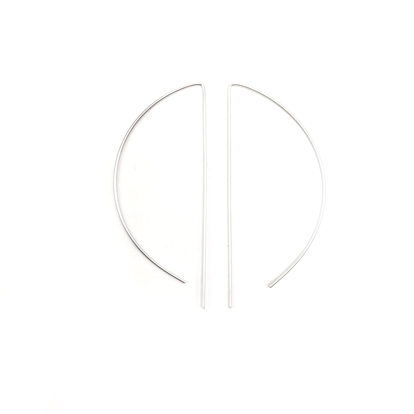 Ultra thin elipse earrings on white background