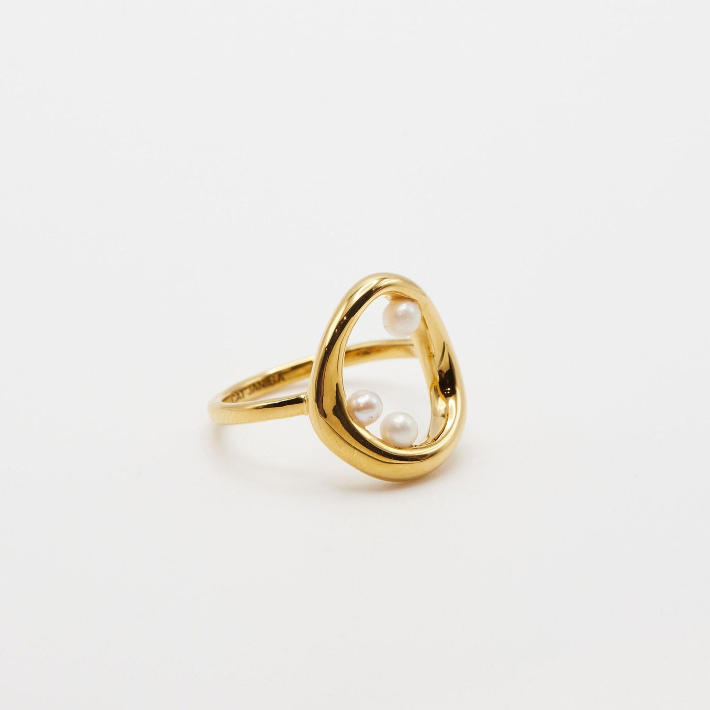 side view of the bubble pearl ring on white background
