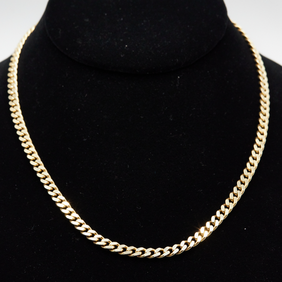 14k yellow gold curb chain on black neck form