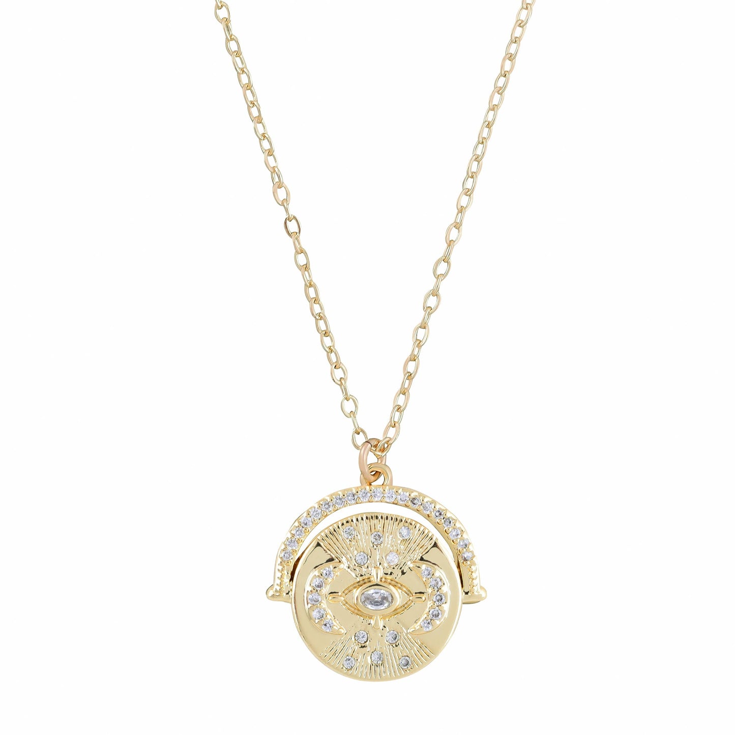 Gold necklace with a round pendant on a white background