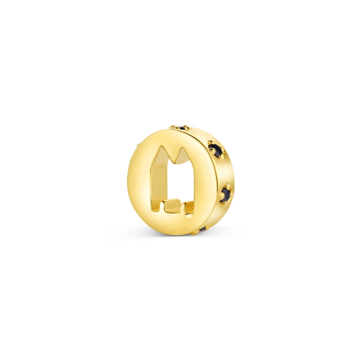 yellow gold circle charm with castle cut out and black diamond accents