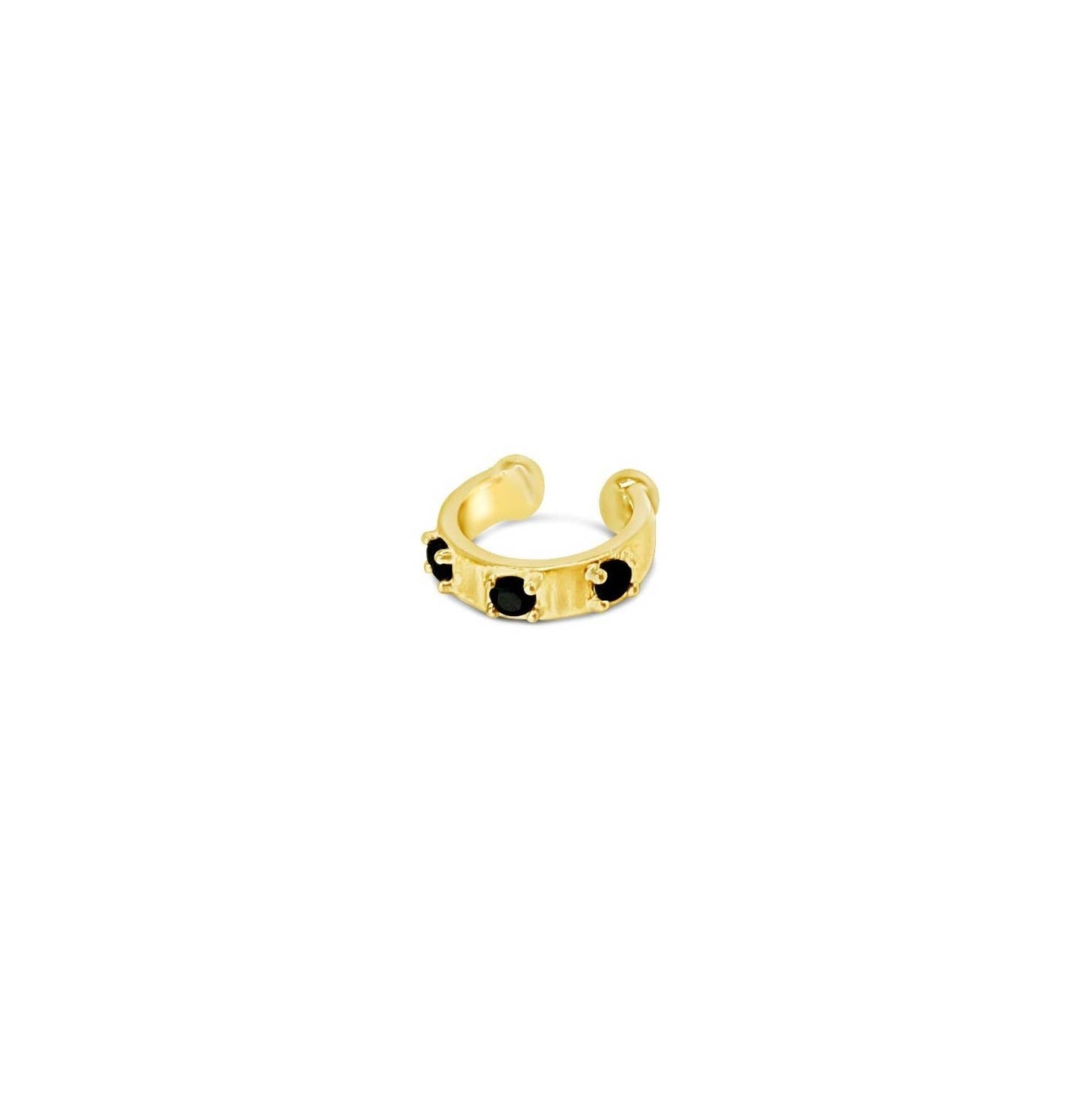 Gold open ear cuff with black spinel on a white background