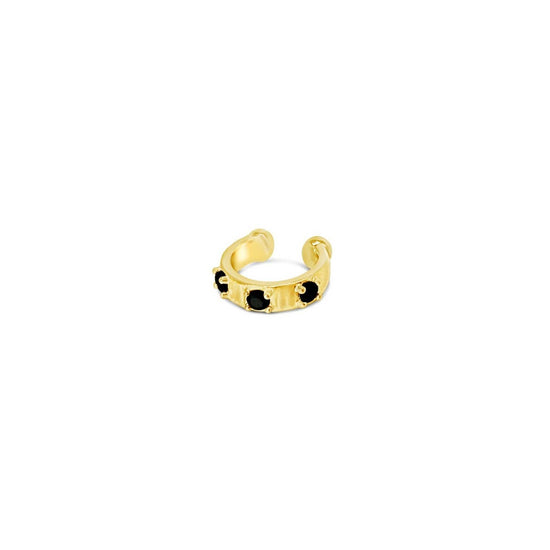Gold open ear cuff with black spinel on a white background