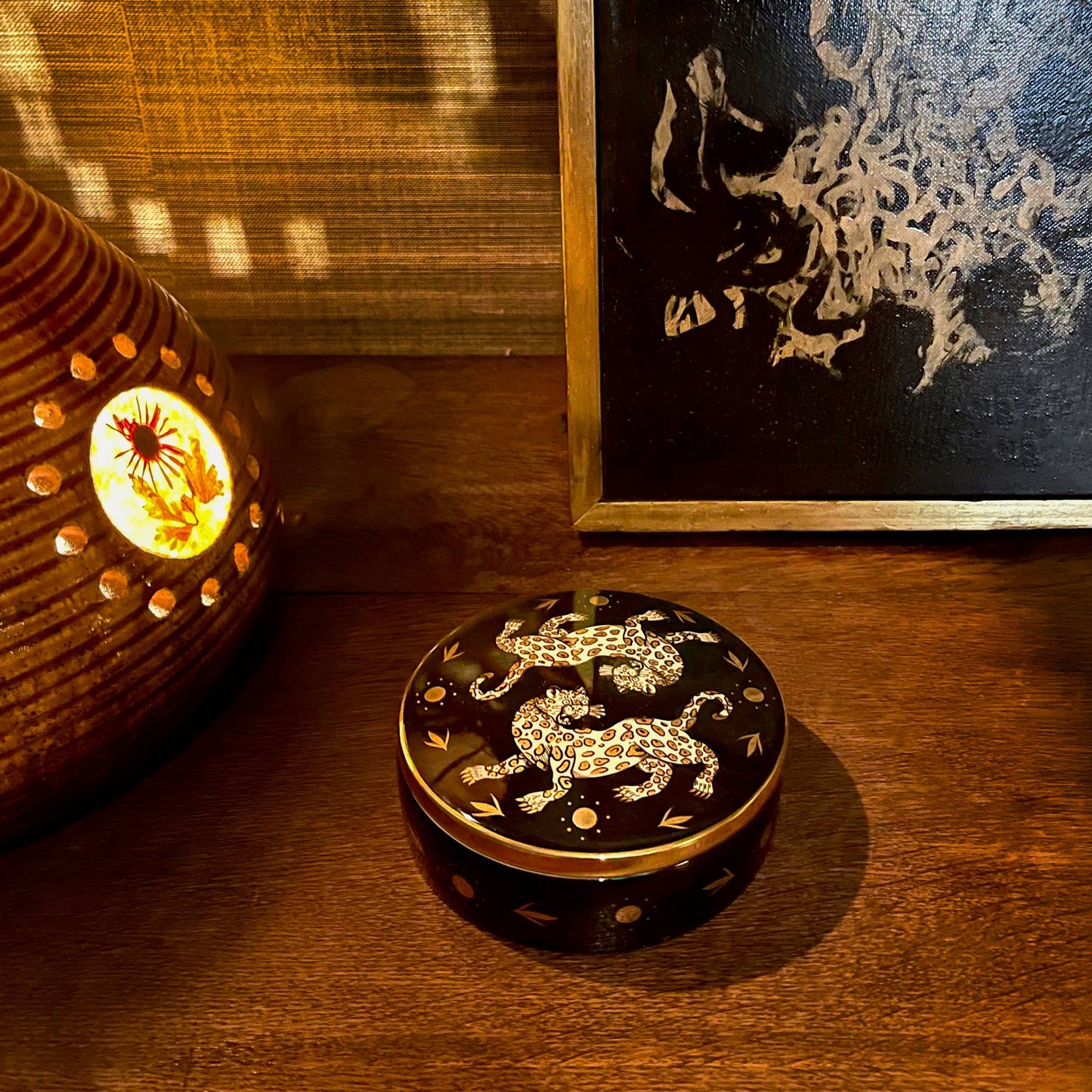 the leopard trinket box on a wood table