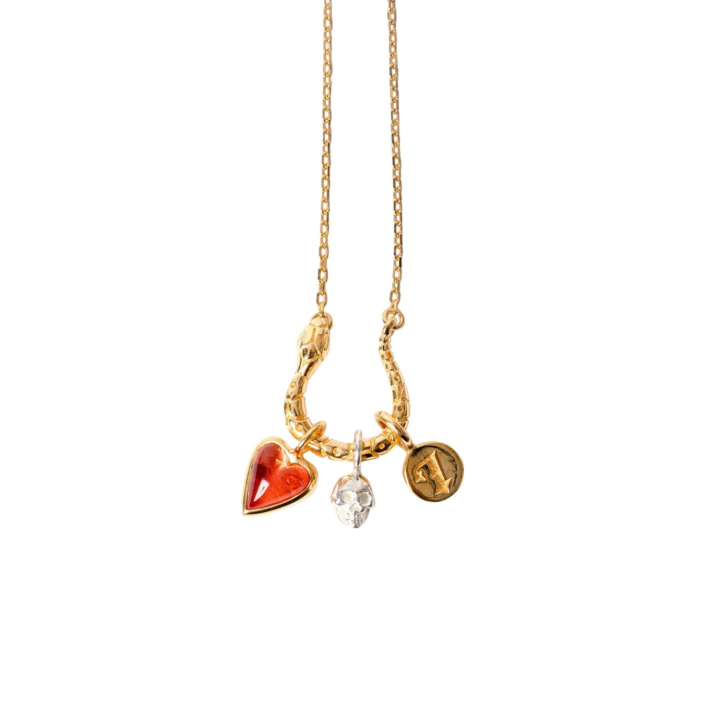 Gold necklace with heart, round, and coin-shaped charms on a white background