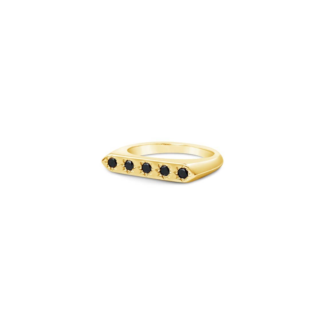 Gold ring with black gemstones on a white background