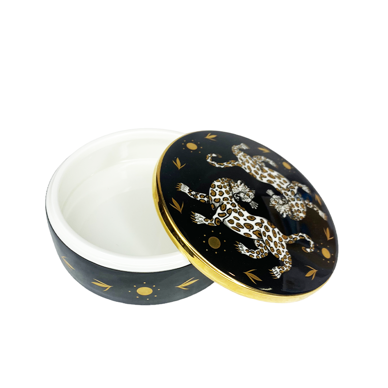 the leopard trinket box displayed with the lid open on a white background