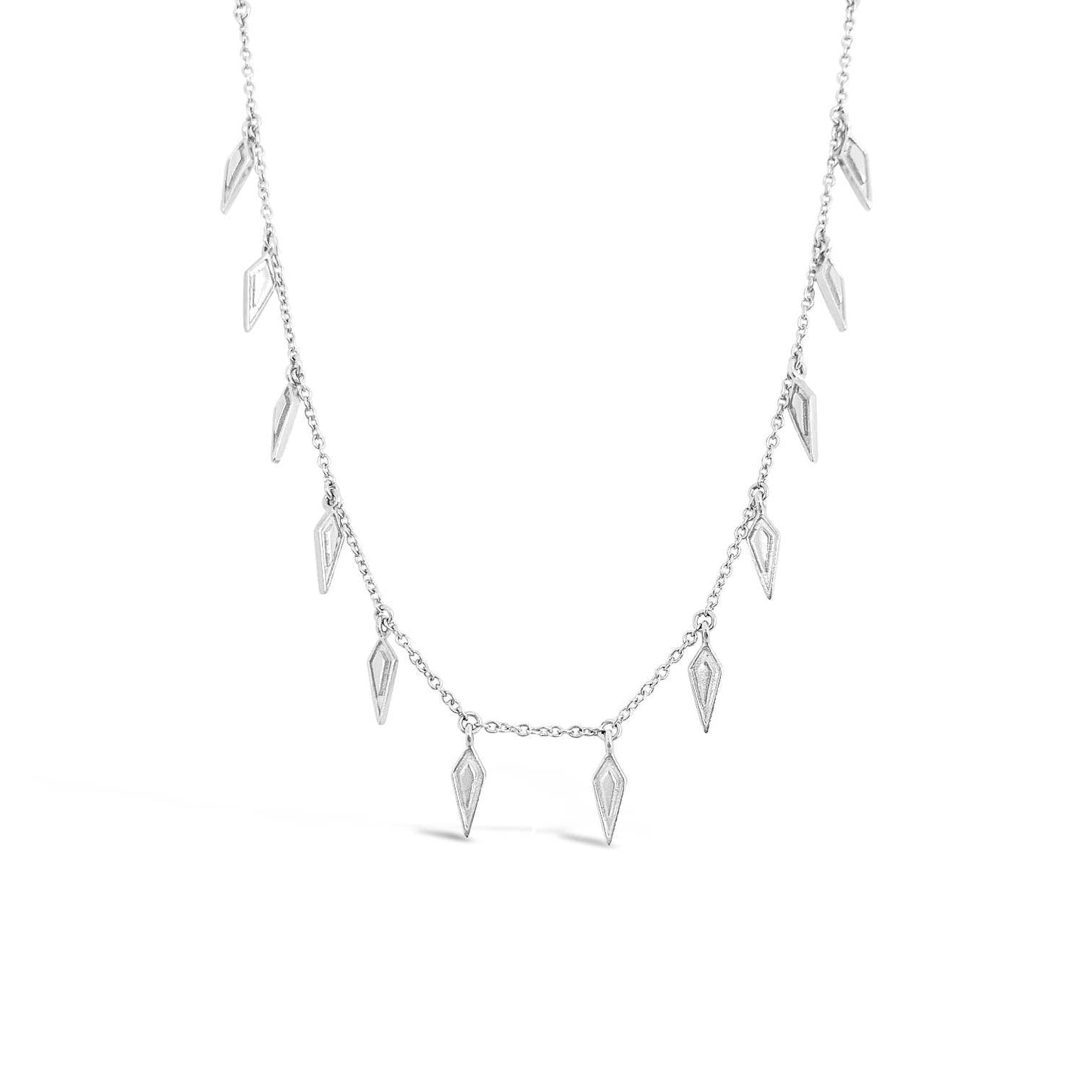 Silver necklace with KITE-shaped pendants on a white background