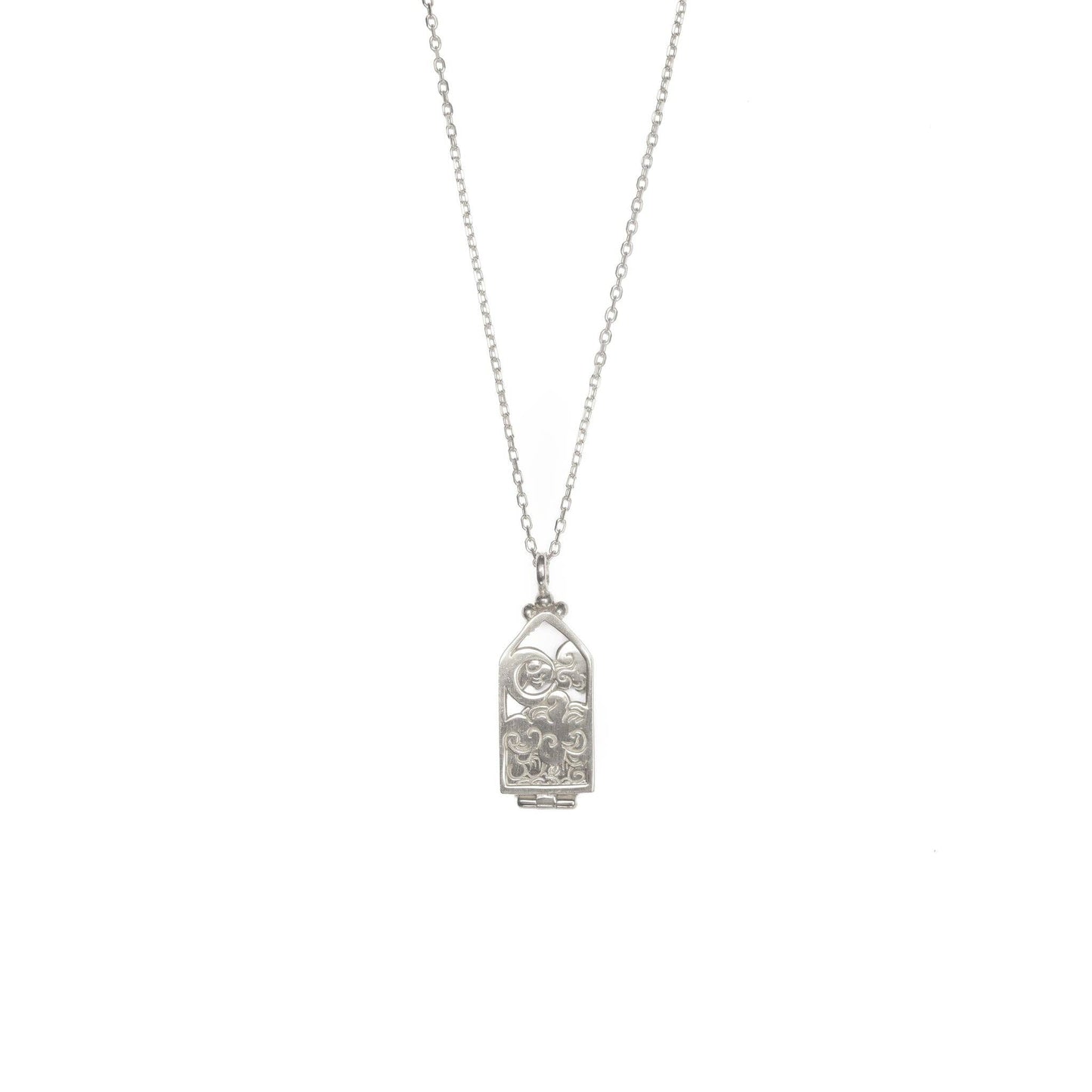 Silver necklace with a decorative pendant on a white background
