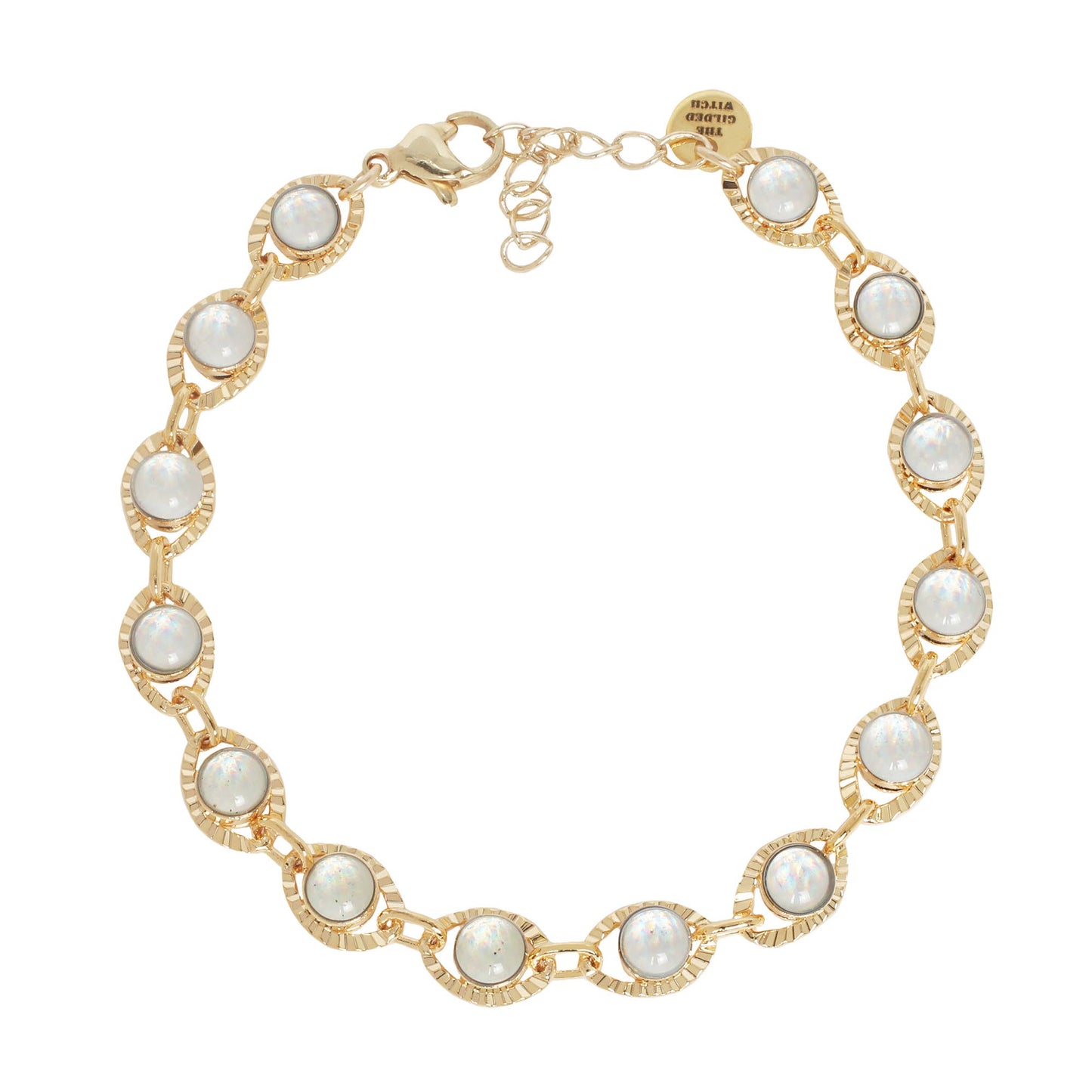 Gold bracelet with glass stones  in shape of an eye on a white background