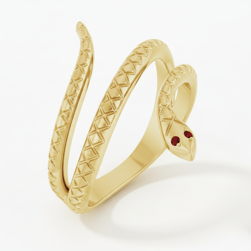 Gold snake-shaped ring with red eyes on a dark blue background