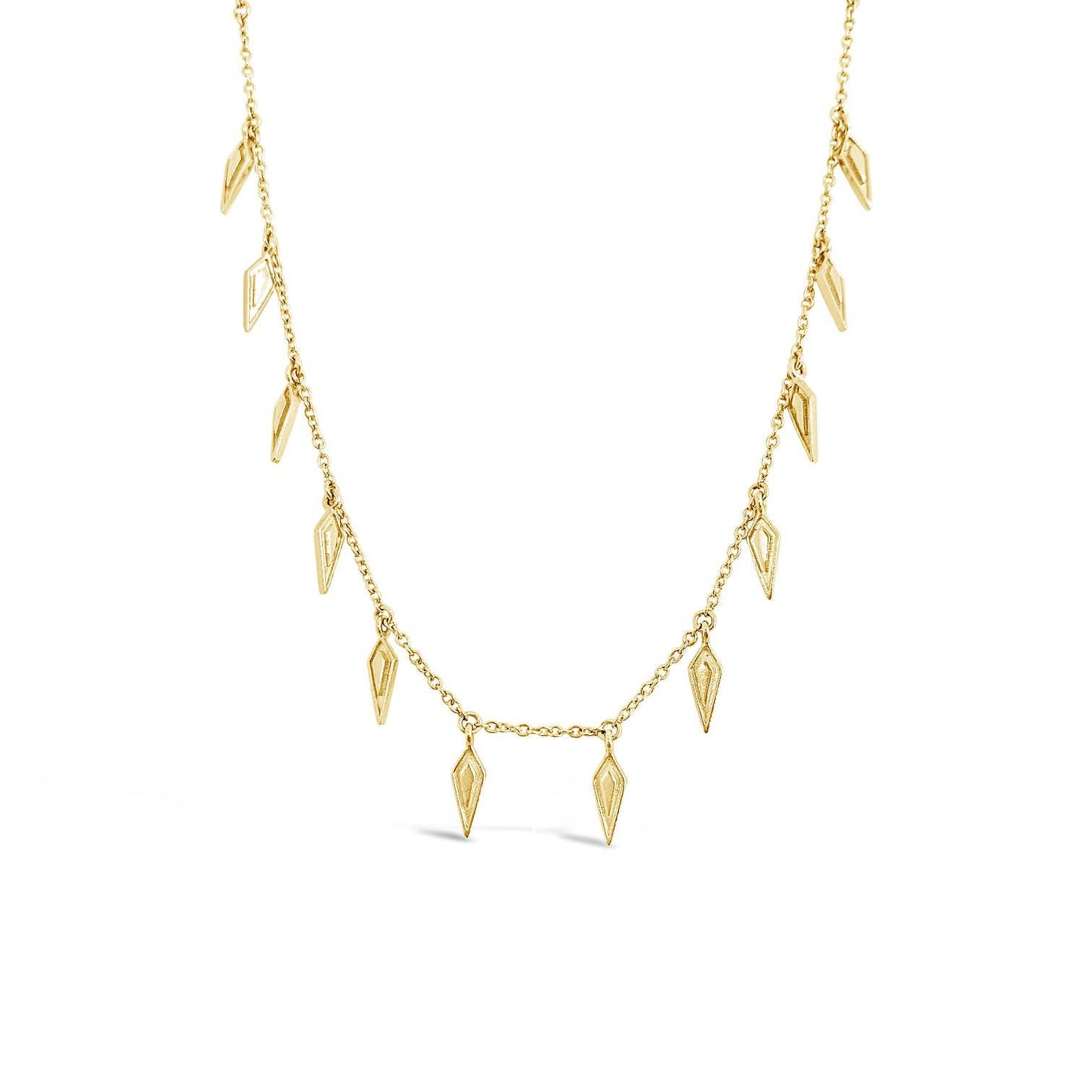 Gold necklace with leaf-shaped pendants on a white background