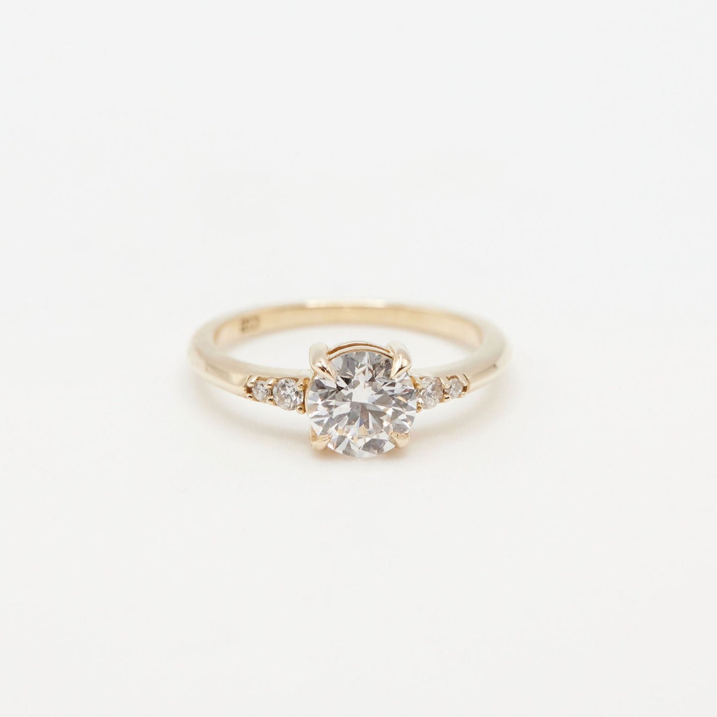 Five stone ring on white background