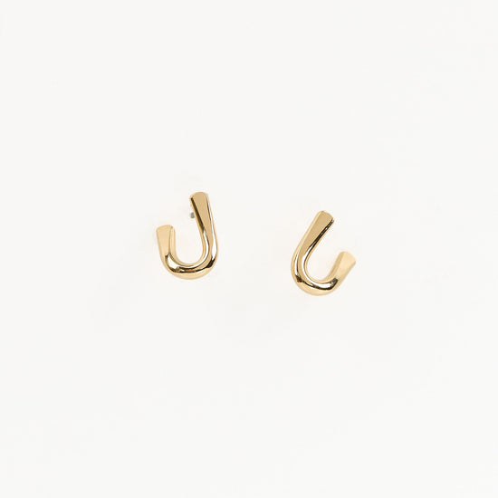 U earrings on white background