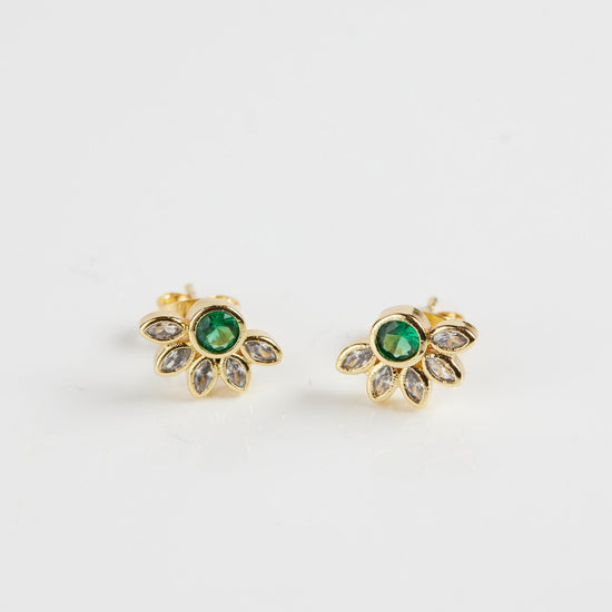 Marquise crown gemstone studs on white background
