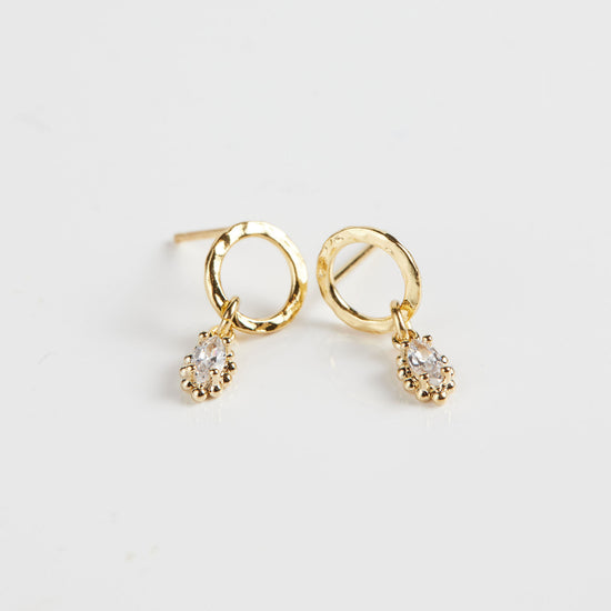Marquise drop earrings on white background