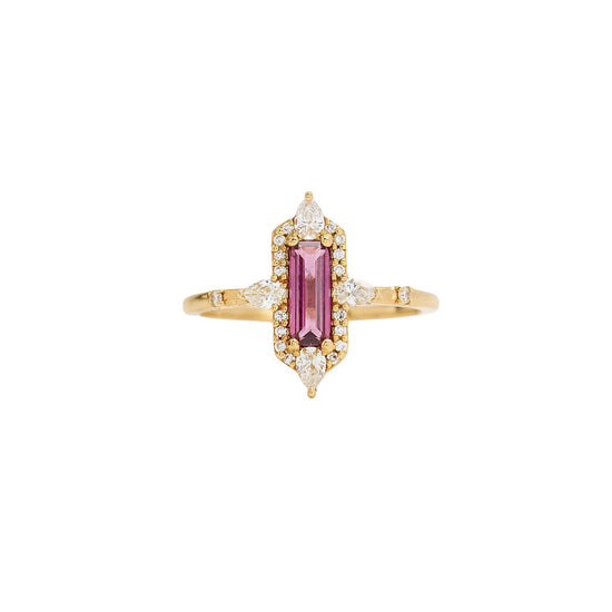 Gold ring with a pink gemstone and diamonds on a white background