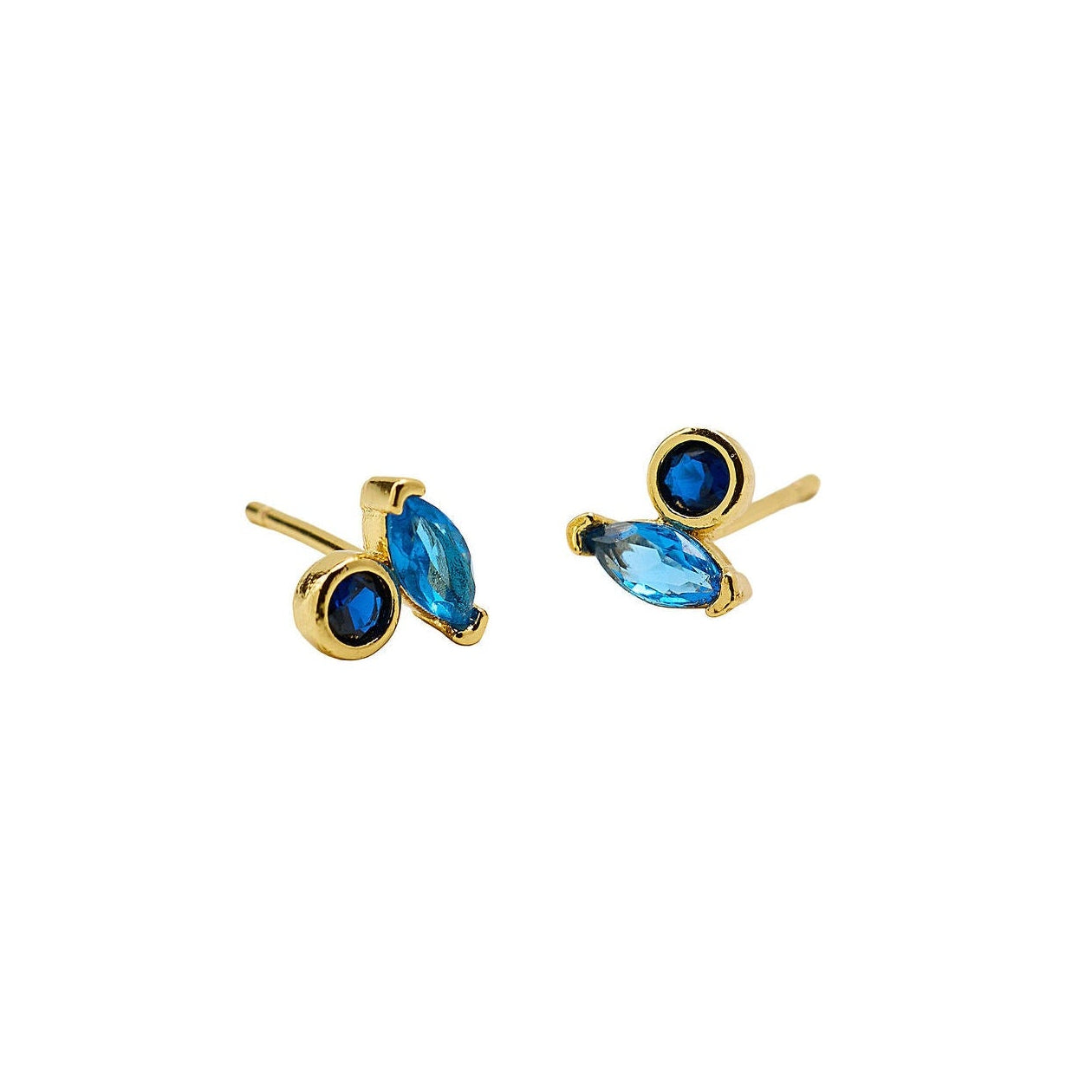 Gold earrings with blue gemstones on a white background