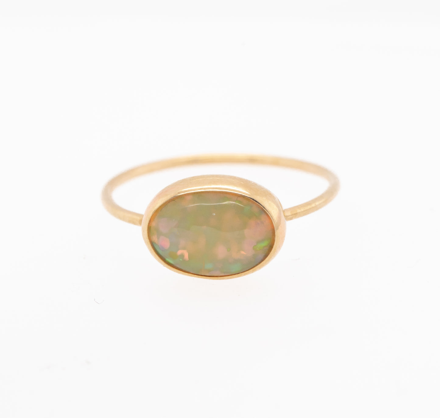 opal ring on white background