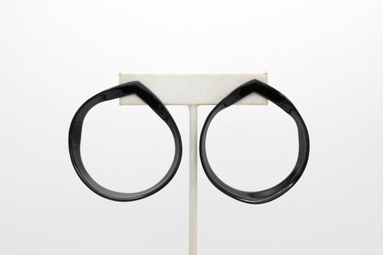 Open weave hoop on earring stand 