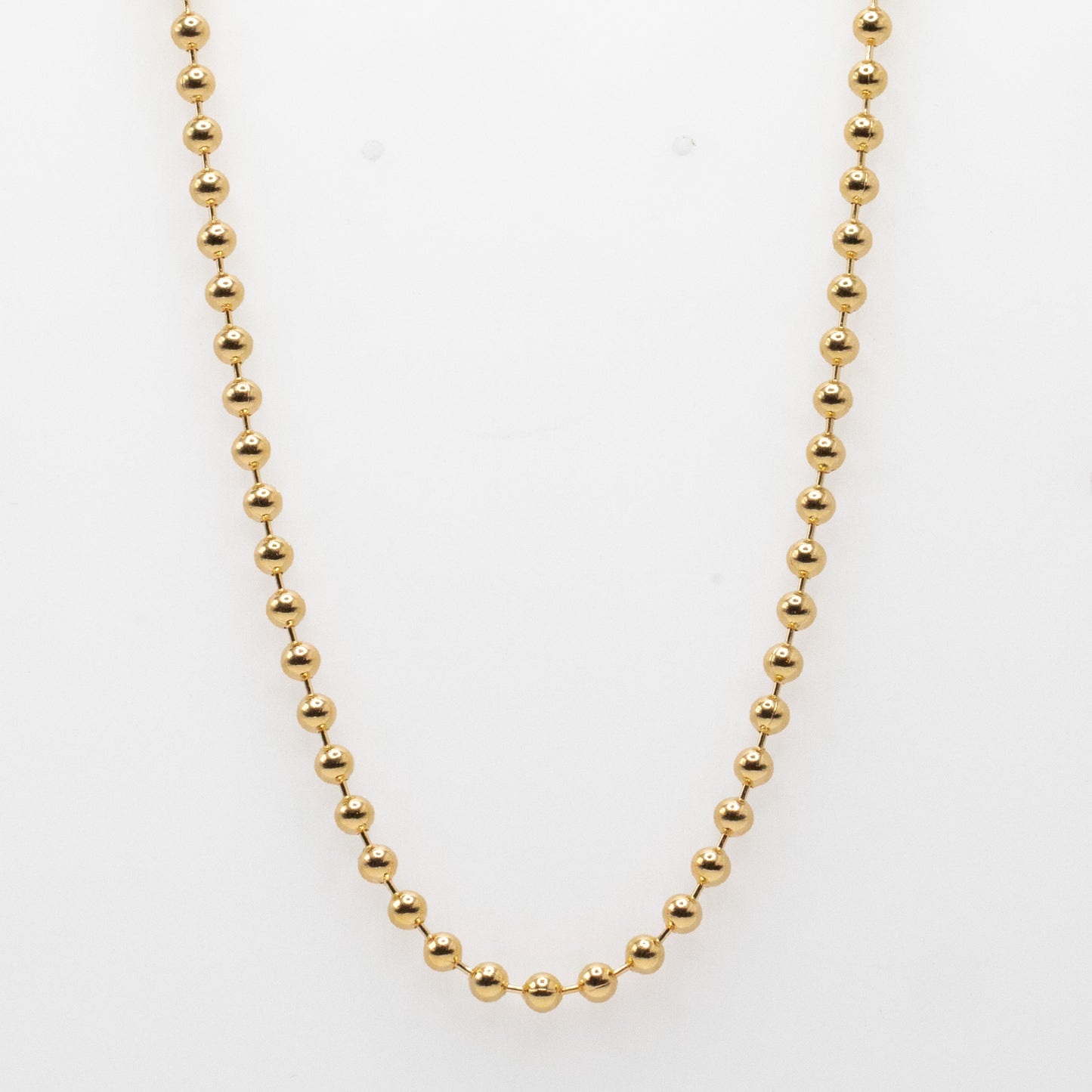 gold fill beaded chain on white background