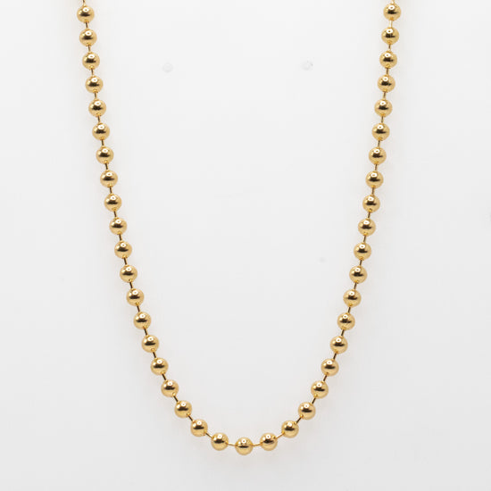 gold fill beaded chain on white background