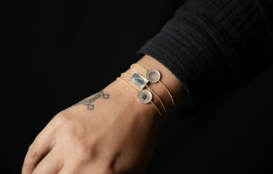 motif bracelet on hand
