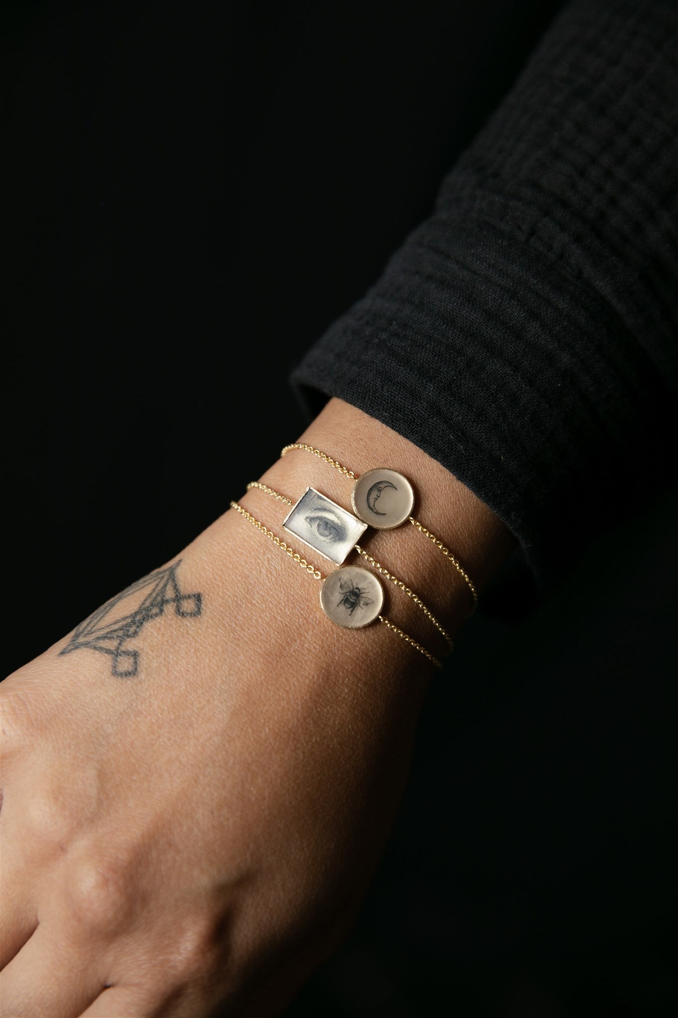 motif bracelet on hand