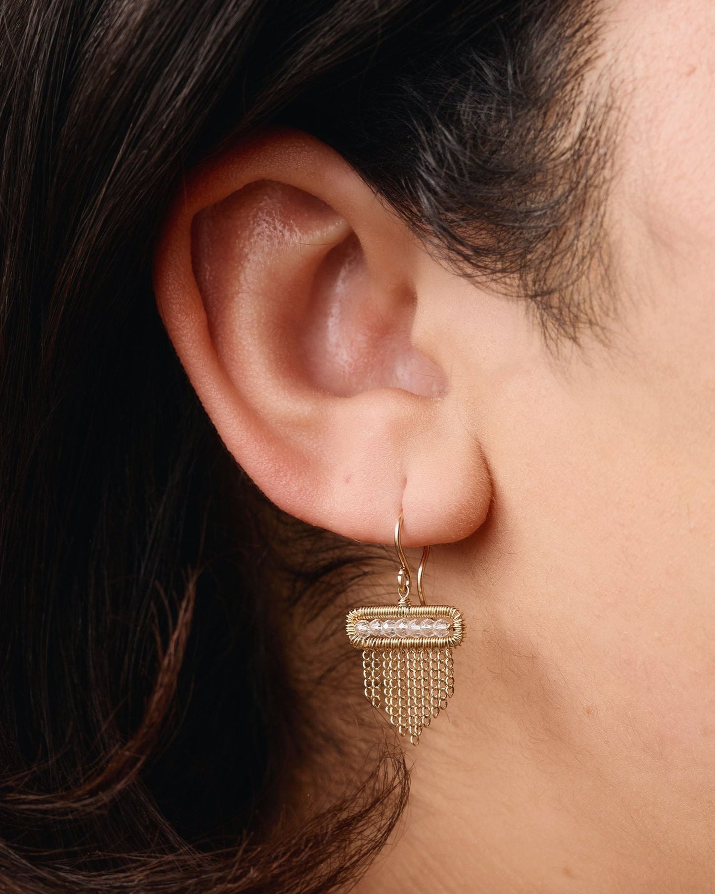 Dainty quartz earrings on model