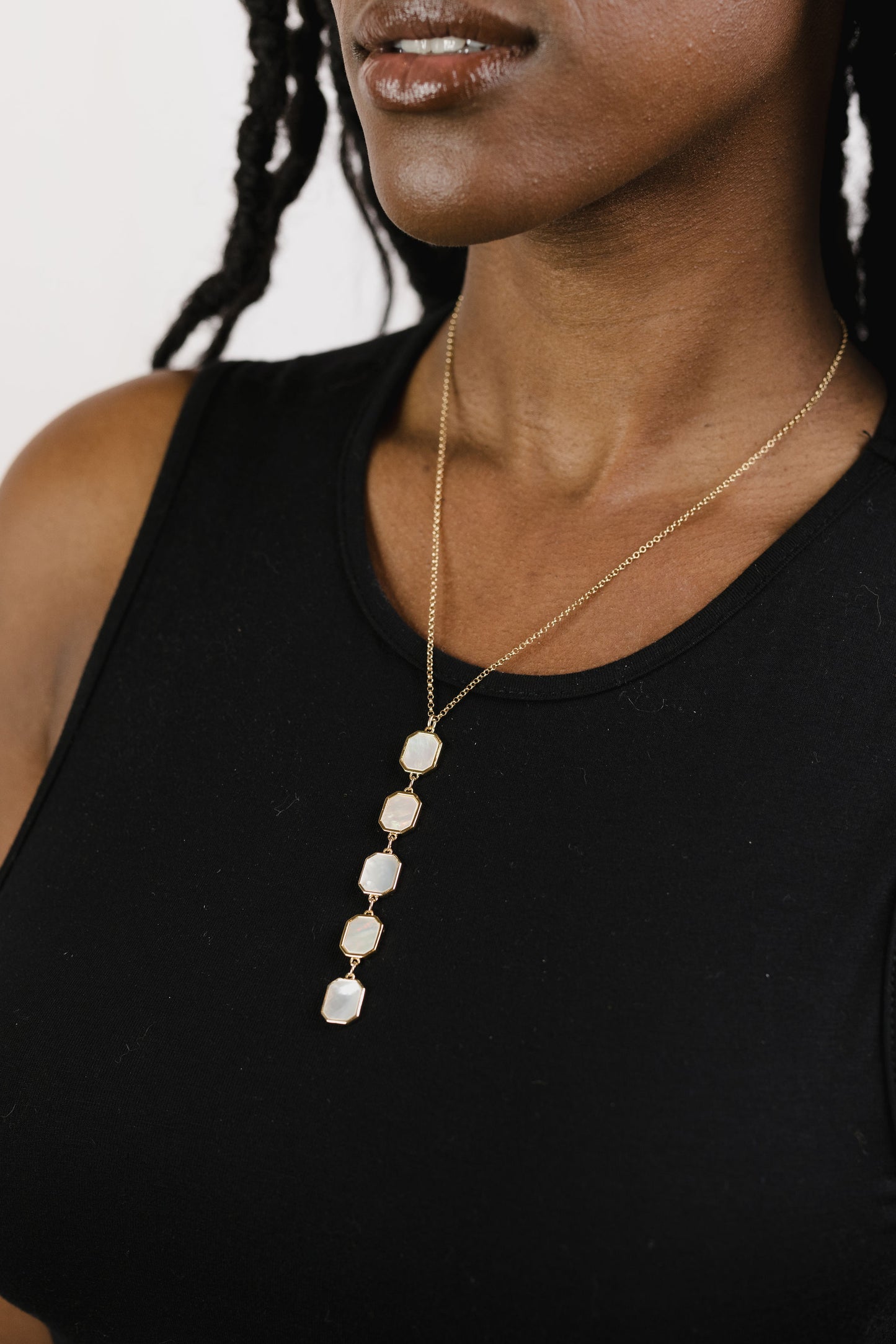 Mother of pearl drop necklace on model
