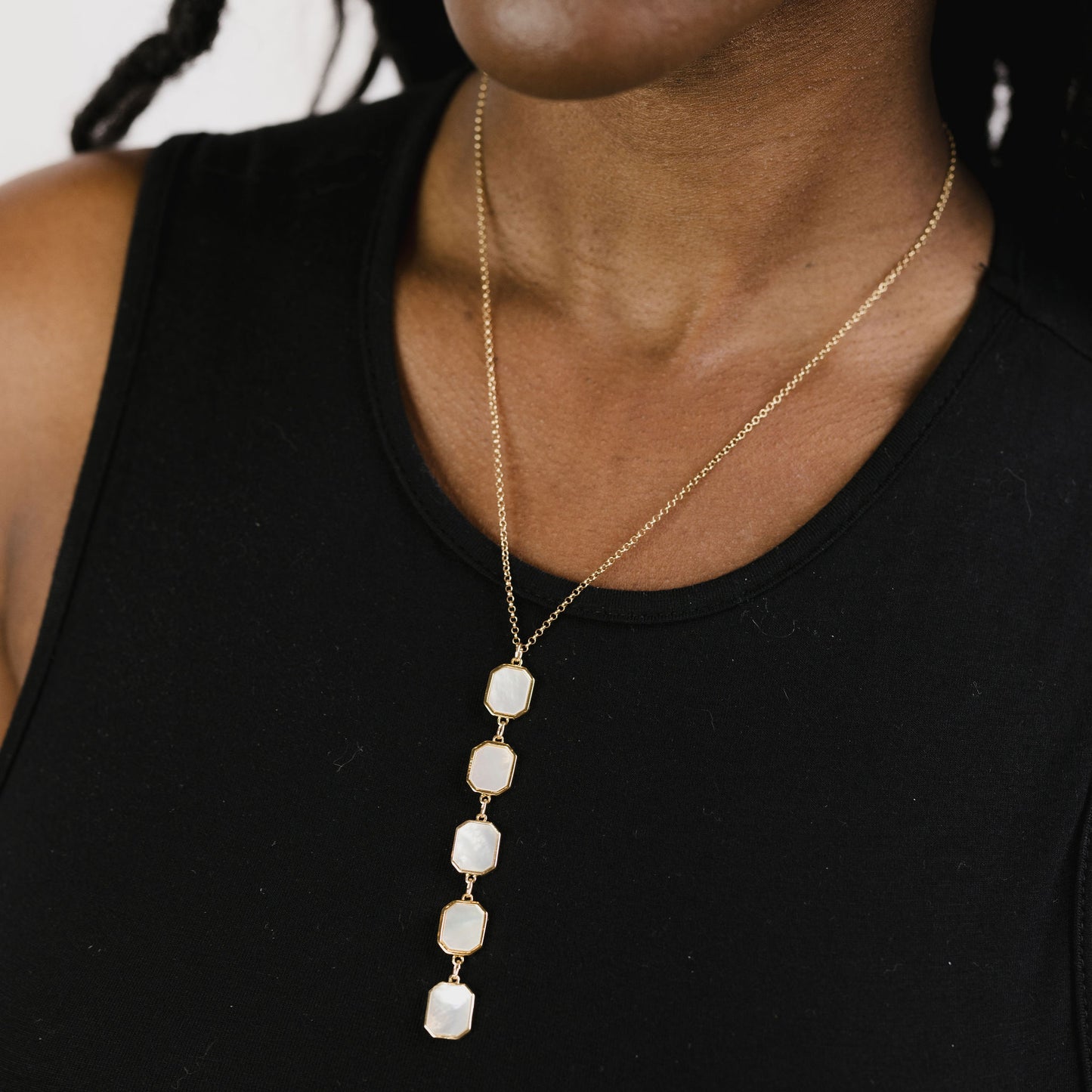 Mother of pearl drop necklace on model