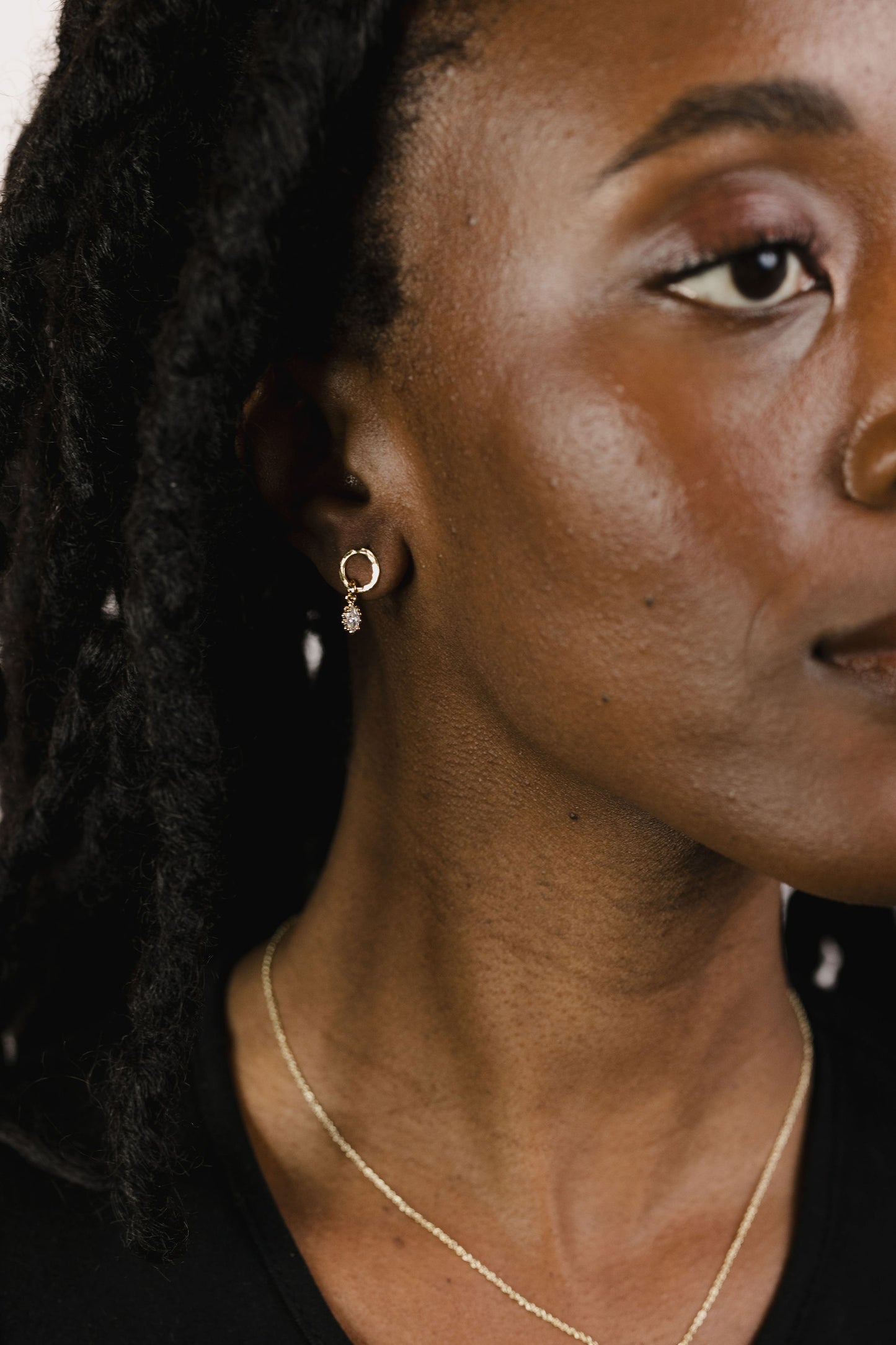 Load image into Gallery viewer, Marquise drop circle stud earrings on a model
