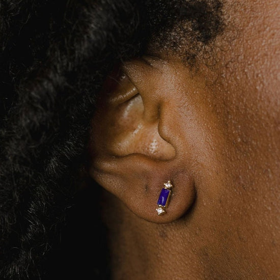 Jane stud earrings on a model