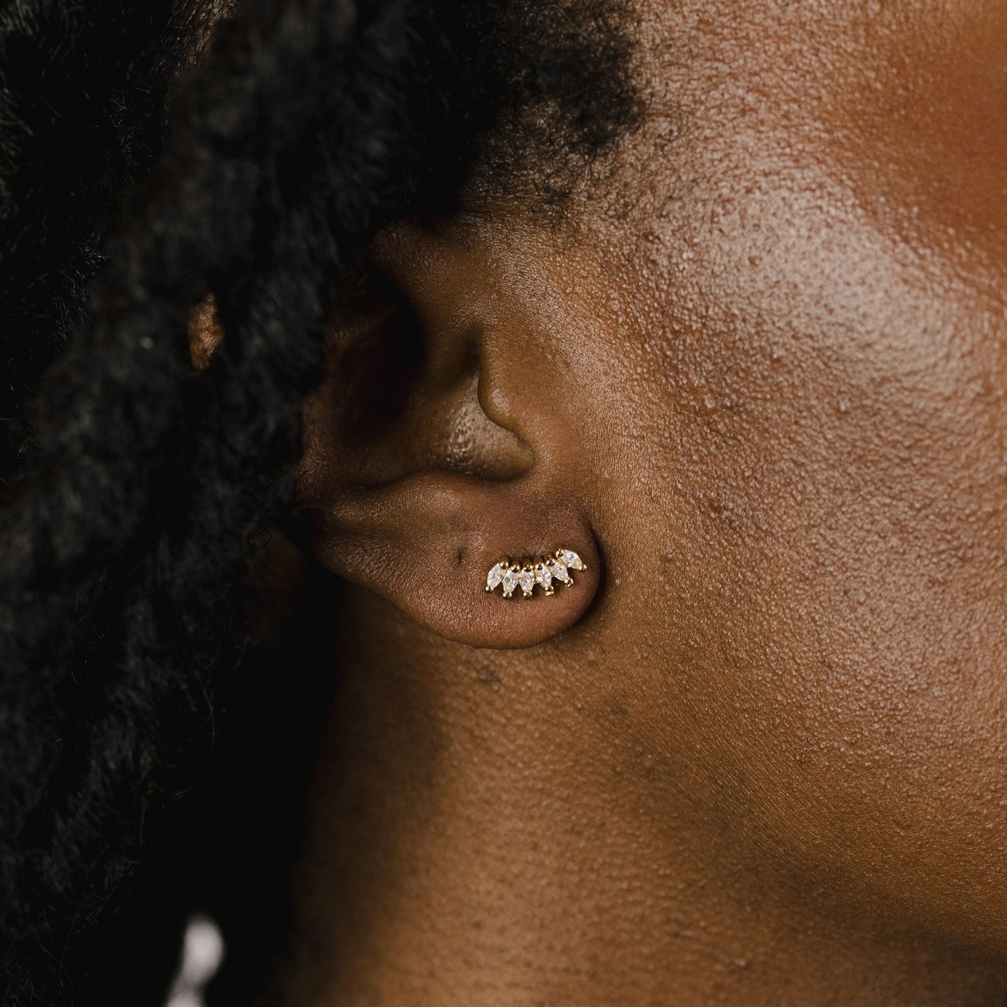 Marquise studs on a model