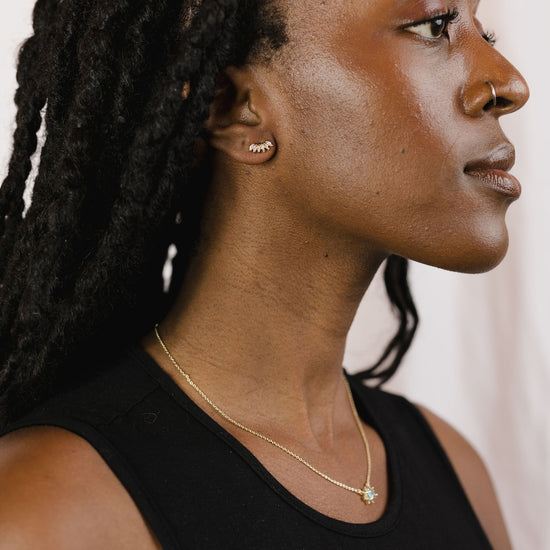 Marquise studs on a model