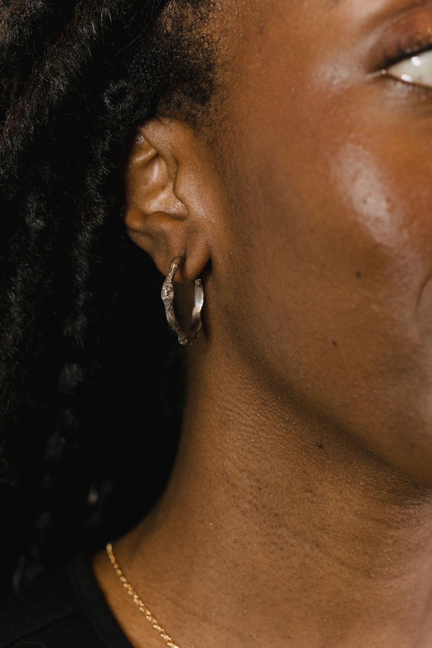 Oxidized sterling earrings on model
