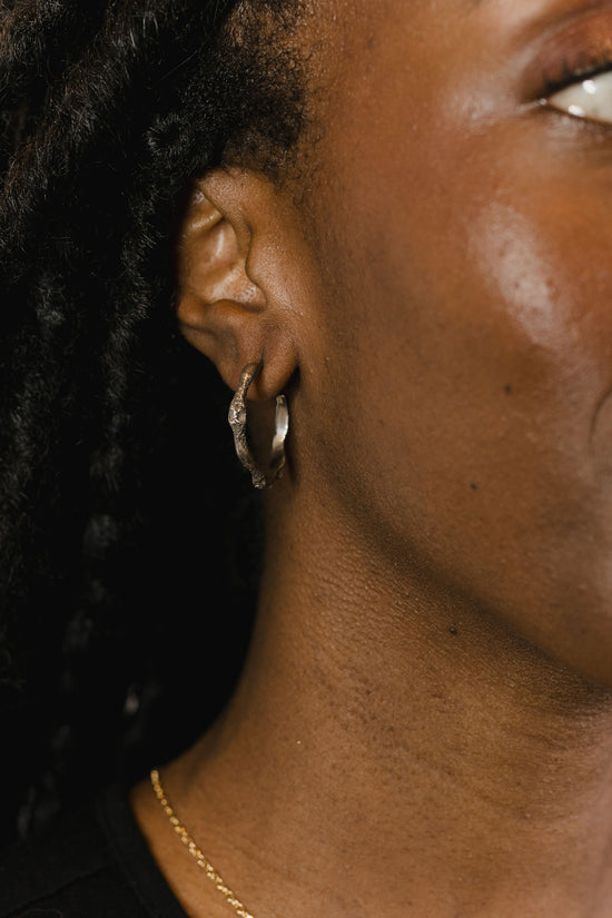 Load image into Gallery viewer, Oxidized sterling earrings on model
