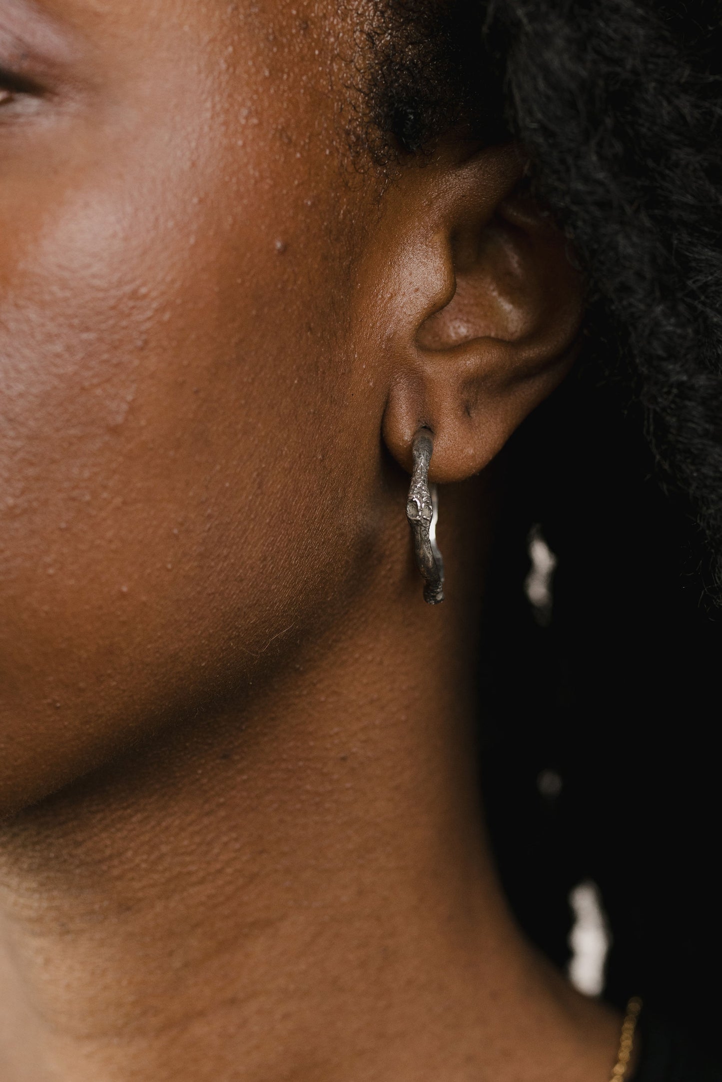 Oxidized sterling earrings on model