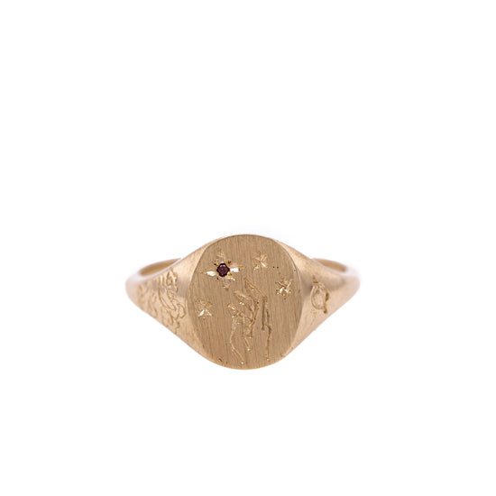 Hand-engraved Garnet gold signet ring with intricate design on a clean white background