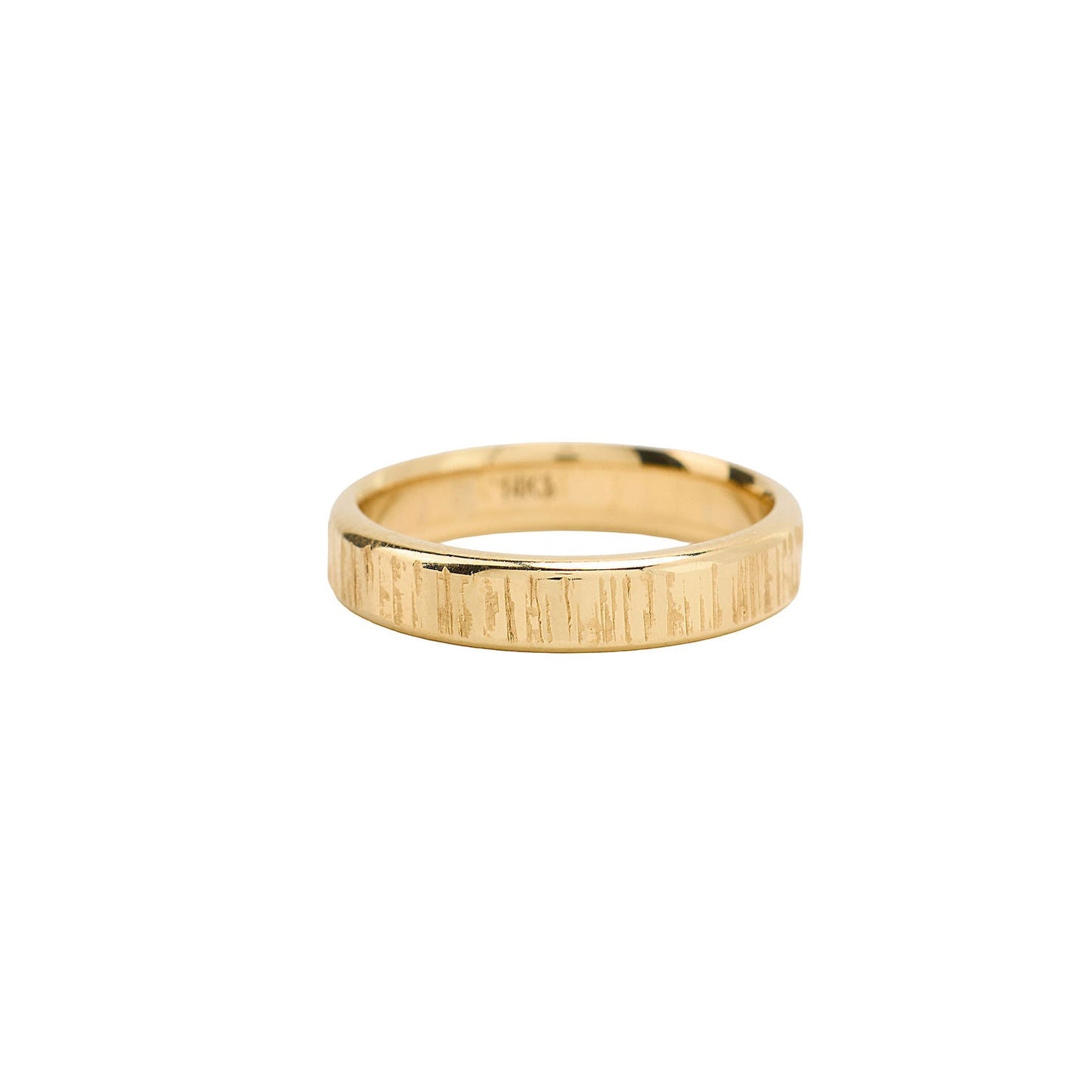 Gold ring on a white background