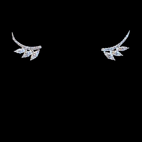 white gold stud earrings in the shape of an arc with three marquise shaped leaves coming off the side on a white background