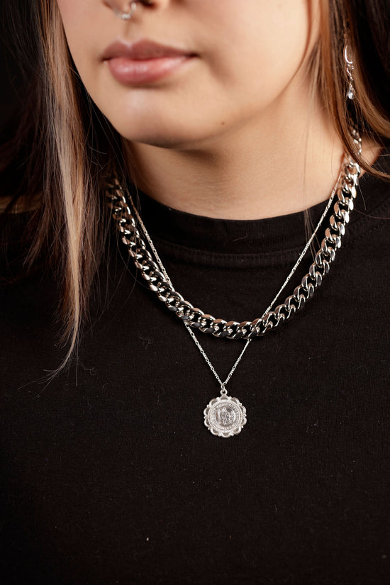 Load image into Gallery viewer, model wearing silver scalloped pendant

