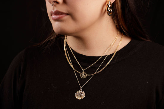 sacred heart necklace on model