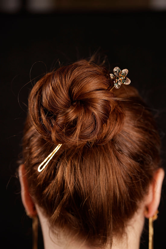 orchid hair pin on model