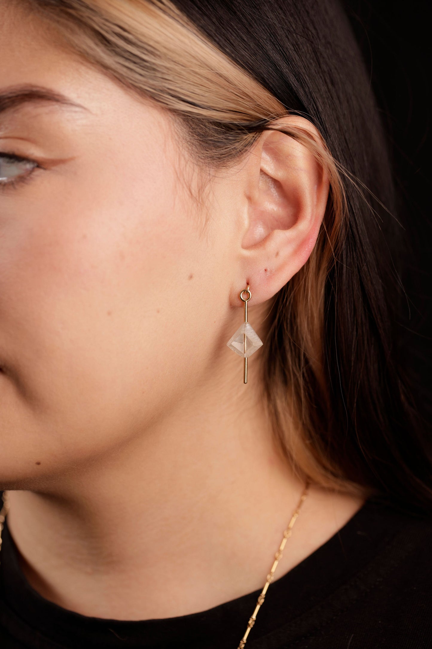 lucid kite earrings on model