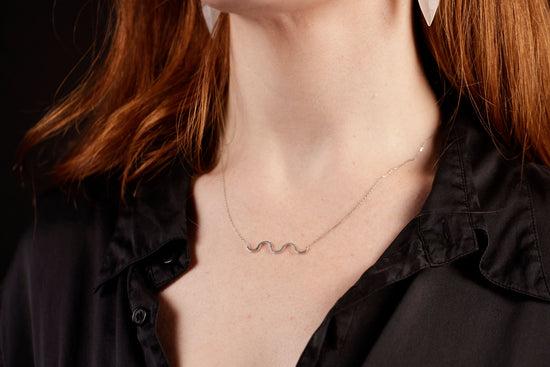 wave necklace on model